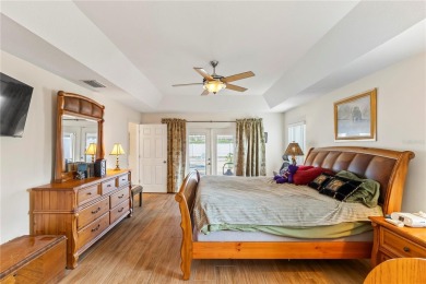 Welcome to this beautifully maintained 3 bedroom, 2 bath pool on The Grand Club Cypress Course in Florida - for sale on GolfHomes.com, golf home, golf lot