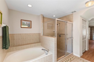 Welcome to this beautifully maintained 3 bedroom, 2 bath pool on The Grand Club Cypress Course in Florida - for sale on GolfHomes.com, golf home, golf lot