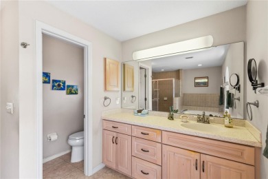 Welcome to this beautifully maintained 3 bedroom, 2 bath pool on The Grand Club Cypress Course in Florida - for sale on GolfHomes.com, golf home, golf lot
