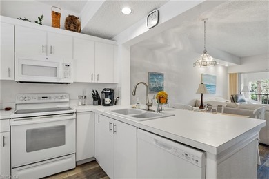 Must see this lovely two bedroom, two and a half baths condo on Quail Run Golf Club In Naples in Florida - for sale on GolfHomes.com, golf home, golf lot