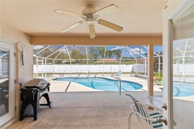 Welcome to this beautifully maintained 3 bedroom, 2 bath pool on The Grand Club Cypress Course in Florida - for sale on GolfHomes.com, golf home, golf lot