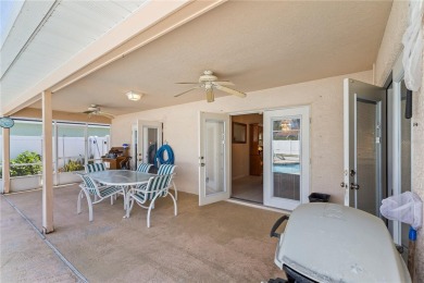 Welcome to this beautifully maintained 3 bedroom, 2 bath pool on The Grand Club Cypress Course in Florida - for sale on GolfHomes.com, golf home, golf lot