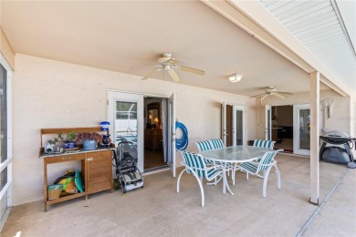 Welcome to this beautifully maintained 3 bedroom, 2 bath pool on The Grand Club Cypress Course in Florida - for sale on GolfHomes.com, golf home, golf lot