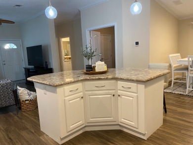THIS 2018 CHAMPION HOME OFFERS ALL THE LUXURY MUST HAVES on Silver Dollar Golf and Trap Club in Florida - for sale on GolfHomes.com, golf home, golf lot