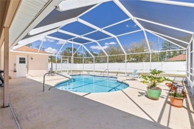 Welcome to this beautifully maintained 3 bedroom, 2 bath pool on The Grand Club Cypress Course in Florida - for sale on GolfHomes.com, golf home, golf lot