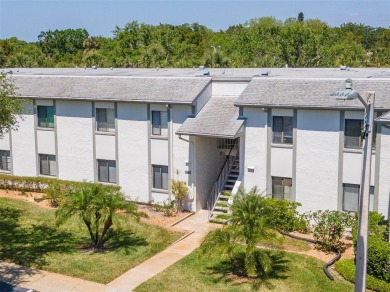 Discover refined living in the heart of Cypress Estates at East on East Lake Woodlands Country Club in Florida - for sale on GolfHomes.com, golf home, golf lot