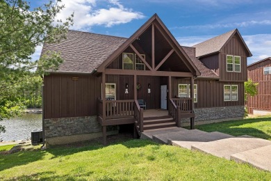 Welcome to your dream retreat at Stonebridge Village! Nestled in on Ledgestone Country Club and Golf Course in Missouri - for sale on GolfHomes.com, golf home, golf lot