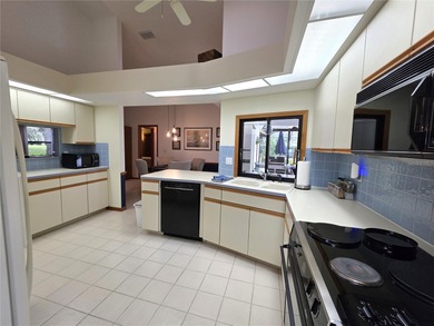 This 4 bed 2.5 bath home is in the gated Community of Glen lakes on Glen Lakes Country Club in Florida - for sale on GolfHomes.com, golf home, golf lot