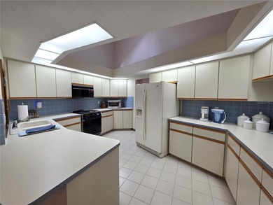 This 4 bed 2.5 bath home is in the gated Community of Glen lakes on Glen Lakes Country Club in Florida - for sale on GolfHomes.com, golf home, golf lot