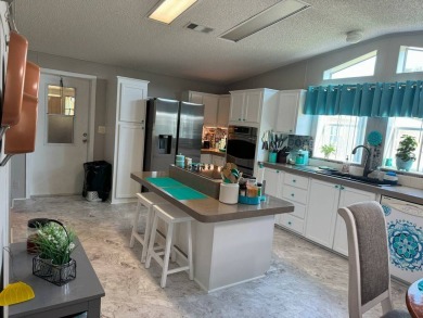 Experience luxury living in this stunning 1760 sq ft on Four Lakes Golf Club in Florida - for sale on GolfHomes.com, golf home, golf lot