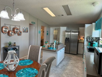 Experience luxury living in this stunning 1760 sq ft on Four Lakes Golf Club in Florida - for sale on GolfHomes.com, golf home, golf lot