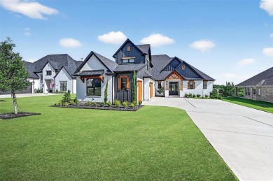 Experience modern luxury at 2028 Fox Bend Trace, a new custom on The Bridges Golf Club in Texas - for sale on GolfHomes.com, golf home, golf lot
