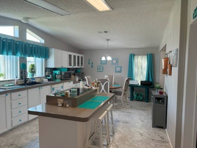 Experience luxury living in this stunning 1760 sq ft on Four Lakes Golf Club in Florida - for sale on GolfHomes.com, golf home, golf lot