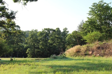 Tee Time is less than 5 minutes from your front door.  This on Holiday Hills Resort and Golf in Missouri - for sale on GolfHomes.com, golf home, golf lot