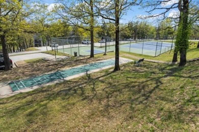 Tee Time is less than 5 minutes from your front door.  This on Holiday Hills Resort and Golf in Missouri - for sale on GolfHomes.com, golf home, golf lot