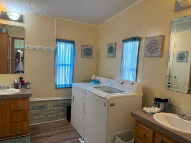 Experience luxury living in this stunning 1760 sq ft on Four Lakes Golf Club in Florida - for sale on GolfHomes.com, golf home, golf lot