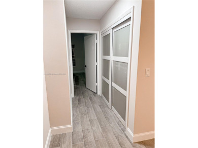 Welcome to your Florida oasis! This fully renovated and spacious on Cypress Lakes Golf Course - West Palm Beach in Florida - for sale on GolfHomes.com, golf home, golf lot