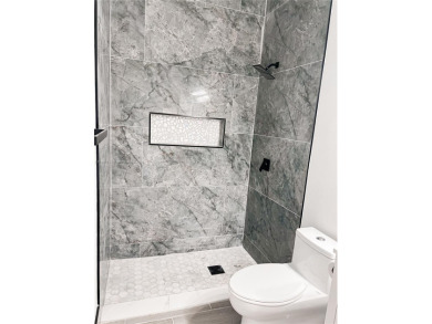 Welcome to your Florida oasis! This fully renovated and spacious on Cypress Lakes Golf Course - West Palm Beach in Florida - for sale on GolfHomes.com, golf home, golf lot