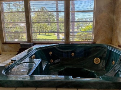 Unique home in Del Tura (55 and over community on leased land) on Del Tura Golf and Country Club in Florida - for sale on GolfHomes.com, golf home, golf lot