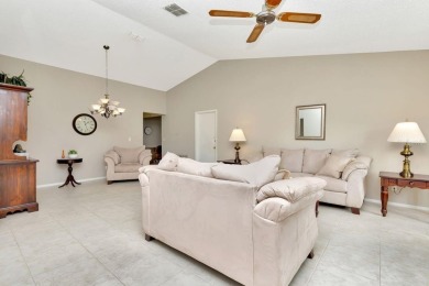 Stunning 2/2 home with a 2-car garage in a vibrant 55+ community on Highland Lakes Executive Golf Course in Florida - for sale on GolfHomes.com, golf home, golf lot