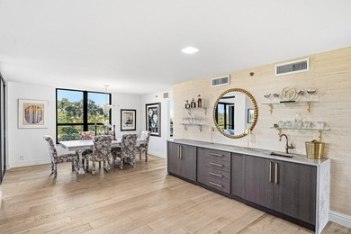 Located in a quiet gated enclave within Boca Pointe on Boca Pointe Country Club in Florida - for sale on GolfHomes.com, golf home, golf lot