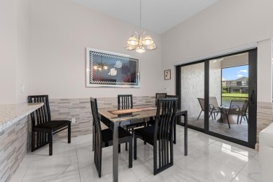 This lovely home overlooking the lake has been upgraded from on Boca Delray Golf and Country Club in Florida - for sale on GolfHomes.com, golf home, golf lot
