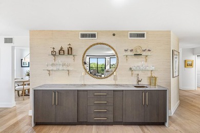 Located in a quiet gated enclave within Boca Pointe on Boca Pointe Country Club in Florida - for sale on GolfHomes.com, golf home, golf lot