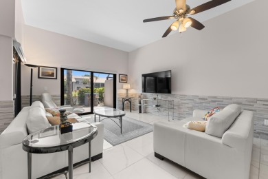 This lovely home overlooking the lake has been upgraded from on Boca Delray Golf and Country Club in Florida - for sale on GolfHomes.com, golf home, golf lot