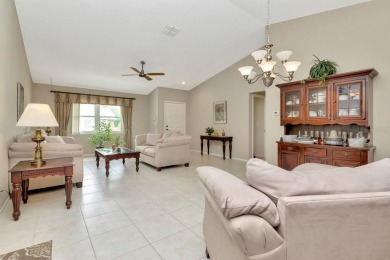 Stunning 2/2 home with a 2-car garage in a vibrant 55+ community on Highland Lakes Executive Golf Course in Florida - for sale on GolfHomes.com, golf home, golf lot