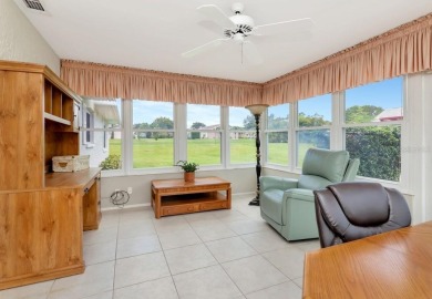 Stunning 2/2 home with a 2-car garage in a vibrant 55+ community on Highland Lakes Executive Golf Course in Florida - for sale on GolfHomes.com, golf home, golf lot