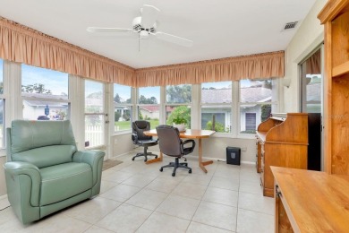 Stunning 2/2 home with a 2-car garage in a vibrant 55+ community on Highland Lakes Executive Golf Course in Florida - for sale on GolfHomes.com, golf home, golf lot
