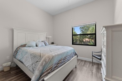 This lovely home overlooking the lake has been upgraded from on Boca Delray Golf and Country Club in Florida - for sale on GolfHomes.com, golf home, golf lot