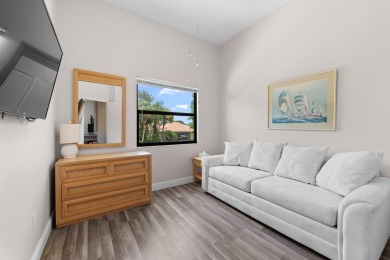 This lovely home overlooking the lake has been upgraded from on Boca Delray Golf and Country Club in Florida - for sale on GolfHomes.com, golf home, golf lot