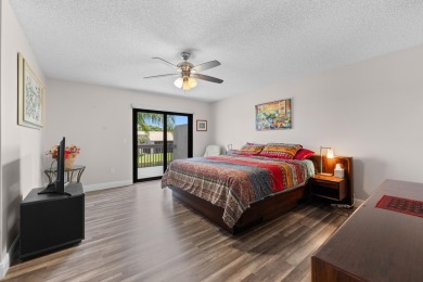 This lovely home overlooking the lake has been upgraded from on Boca Delray Golf and Country Club in Florida - for sale on GolfHomes.com, golf home, golf lot