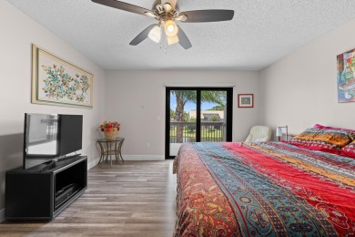 This lovely home overlooking the lake has been upgraded from on Boca Delray Golf and Country Club in Florida - for sale on GolfHomes.com, golf home, golf lot