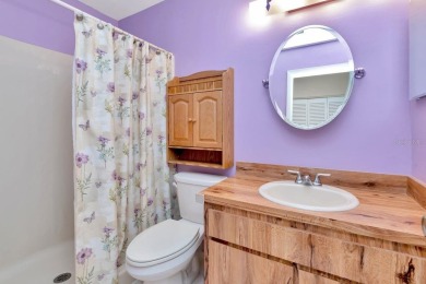 Stunning 2/2 home with a 2-car garage in a vibrant 55+ community on Highland Lakes Executive Golf Course in Florida - for sale on GolfHomes.com, golf home, golf lot