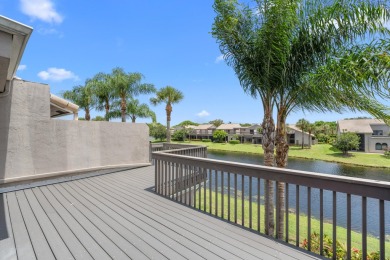 This lovely home overlooking the lake has been upgraded from on Boca Delray Golf and Country Club in Florida - for sale on GolfHomes.com, golf home, golf lot