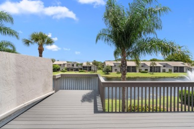 This lovely home overlooking the lake has been upgraded from on Boca Delray Golf and Country Club in Florida - for sale on GolfHomes.com, golf home, golf lot