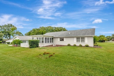 Stunning 2/2 home with a 2-car garage in a vibrant 55+ community on Highland Lakes Executive Golf Course in Florida - for sale on GolfHomes.com, golf home, golf lot