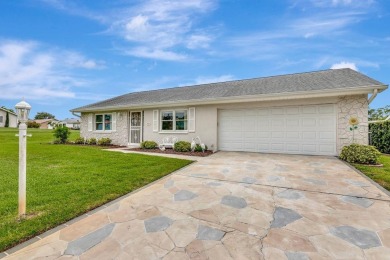 Stunning 2/2 home with a 2-car garage in a vibrant 55+ community on Highland Lakes Executive Golf Course in Florida - for sale on GolfHomes.com, golf home, golf lot