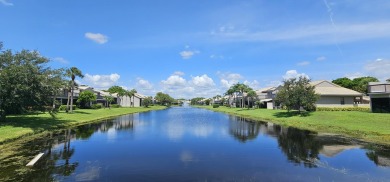 This lovely home overlooking the lake has been upgraded from on Boca Delray Golf and Country Club in Florida - for sale on GolfHomes.com, golf home, golf lot