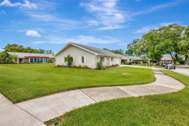 Stunning 2/2 home with a 2-car garage in a vibrant 55+ community on Highland Lakes Executive Golf Course in Florida - for sale on GolfHomes.com, golf home, golf lot