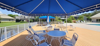 This lovely home overlooking the lake has been upgraded from on Boca Delray Golf and Country Club in Florida - for sale on GolfHomes.com, golf home, golf lot