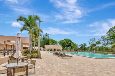 Stunning 2/2 home with a 2-car garage in a vibrant 55+ community on Highland Lakes Executive Golf Course in Florida - for sale on GolfHomes.com, golf home, golf lot