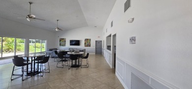 This lovely home overlooking the lake has been upgraded from on Boca Delray Golf and Country Club in Florida - for sale on GolfHomes.com, golf home, golf lot