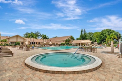 Stunning 2/2 home with a 2-car garage in a vibrant 55+ community on Highland Lakes Executive Golf Course in Florida - for sale on GolfHomes.com, golf home, golf lot