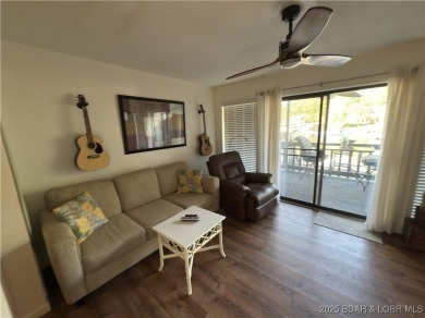 Lakefront Living at Heron Bay! Located at the 21mm, this on Sycamore Creek Golf Club in Missouri - for sale on GolfHomes.com, golf home, golf lot