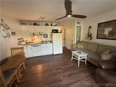 Lakefront Living at Heron Bay! Located at the 21mm, this on Sycamore Creek Golf Club in Missouri - for sale on GolfHomes.com, golf home, golf lot