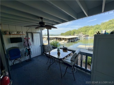 Lakefront Living at Heron Bay! Located at the 21mm, this on Sycamore Creek Golf Club in Missouri - for sale on GolfHomes.com, golf home, golf lot