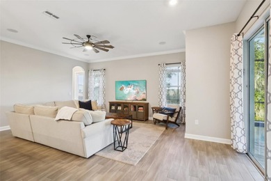 Perfectly positioned on a premium conservation homesite with on ChampionsGate Golf Resort in Florida - for sale on GolfHomes.com, golf home, golf lot